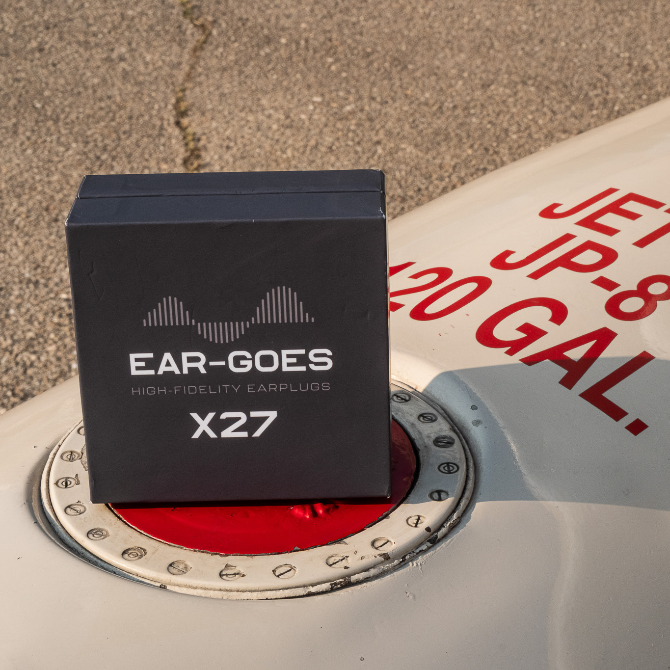 Ear-Goes aviation earplugs on aircraft wing